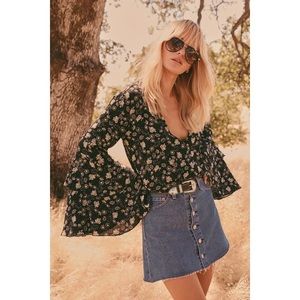 FREE PEOLPLE she’s dainty black floral bodysuit